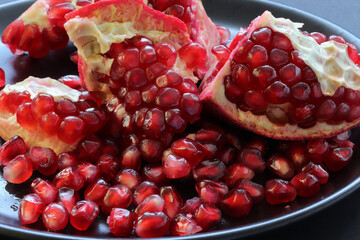 a pomegranate in a plate
