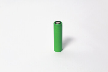 Rechargeable green 18650 Li Ion battery on isolated white background. Often used for electric cigarette, toys, or remote control.