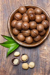 Australian Queensland macadamia nuts, or bush, maroochi, bauple nut, with sawn nutshell, fresh harvest