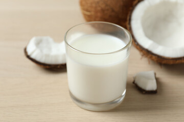 Glass of coconut milk on the table