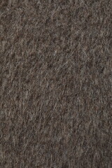 Brown fabric background, close up view