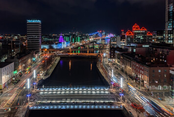 Long-exposure shot of Dublin city center, with winter lights and dynamic traffic trails creating a...