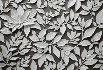 This is a close-up, gray-toned image of a white floral and leaf relief design