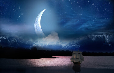 Full moon over the bay where the sailboat is sailing
