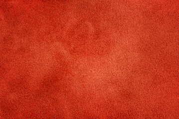 Fototapeta premium Red suede macro photo as background.