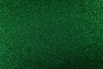 Green glitter background texture. Concept:Crafts, party, decoration.