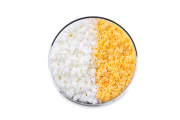 Herring layered salad with potatoes and eggs in a glass on a white isolated background