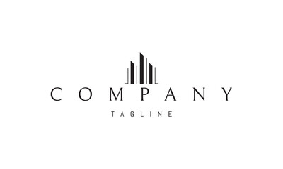 Vector logo with an abstract image of several skyscrapers with shadows.