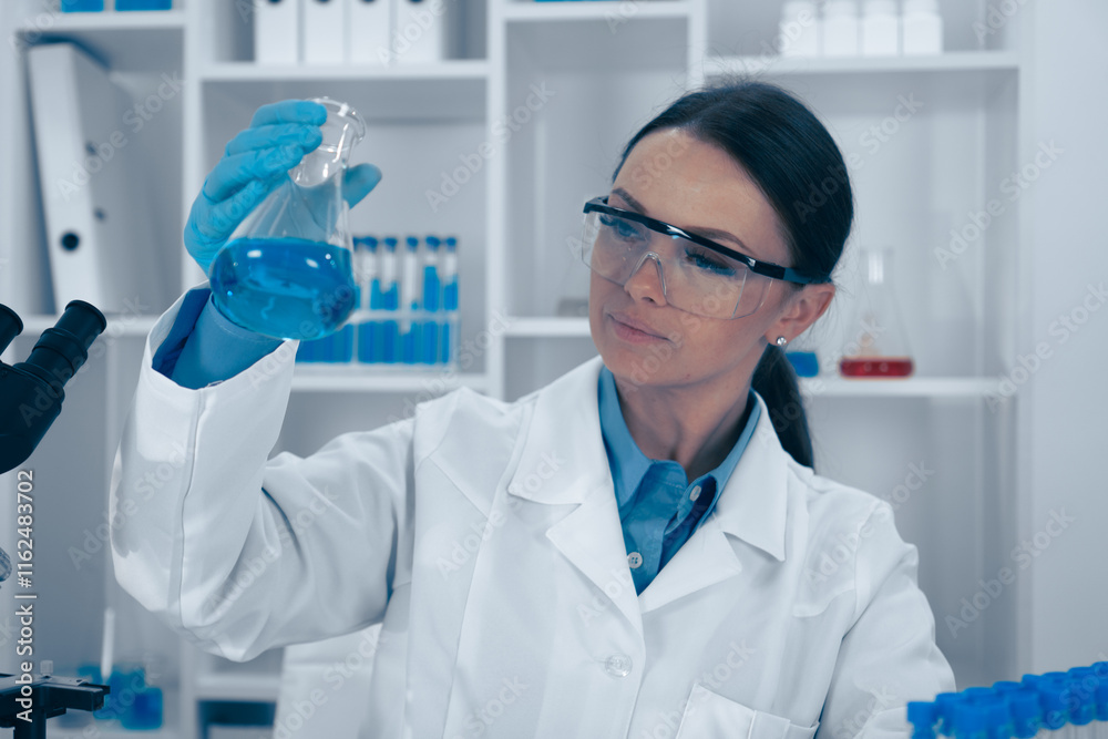 Aufkleber A dedicated scientist analyzes a complex chemical reaction in a laboratory, providing insights that significantly contribute to biochemistry and healthcare through precise experimentation