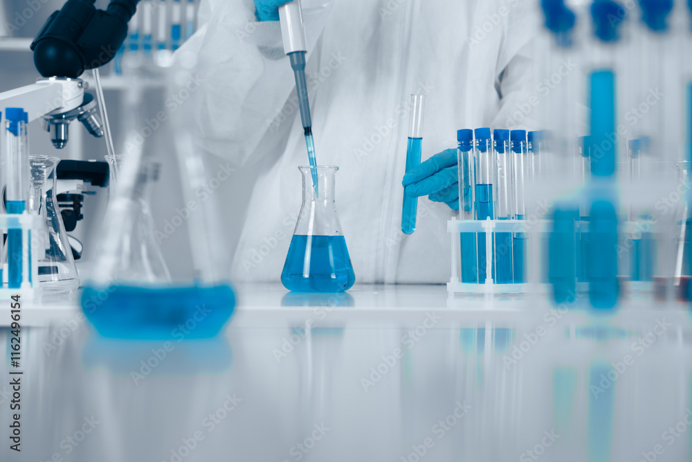 Aufkleber A dedicated scientist conducts detailed liquid measurements in a controlled environment, using precise instruments and quality glassware to ensure accurate results that advance research and knowledge