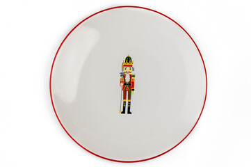Festive nutcracker plate adorned with colorful design perfect for holiday gatherings and...