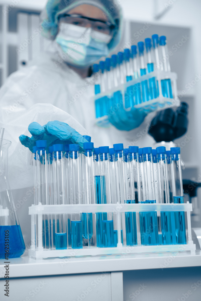 Aufkleber A skilled Laboratory Technician skillfully handling a variety of test tubes in a modern laboratory environment, showcasing the key practices in the fields of analysis and biotechnology