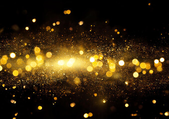 Fototapeta premium 黒い背景にキラキラ輝く黄色の光
