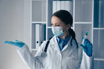Fototapeta premium A healthcare professional showcasing their extensive medical expertise while skillfully handling a syringe, exemplifying their commitment to patient care and wellbeing within a clinical setting