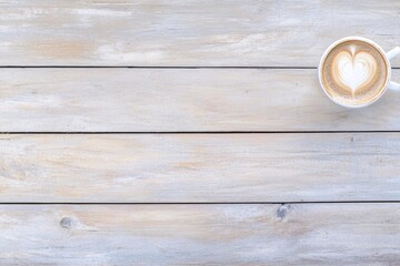 Warm Coffee Cup with Heart Latte Art on Rustic Wooden Table Background