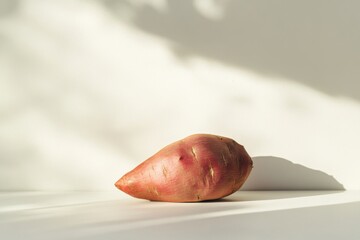  a sweet potato on a white background