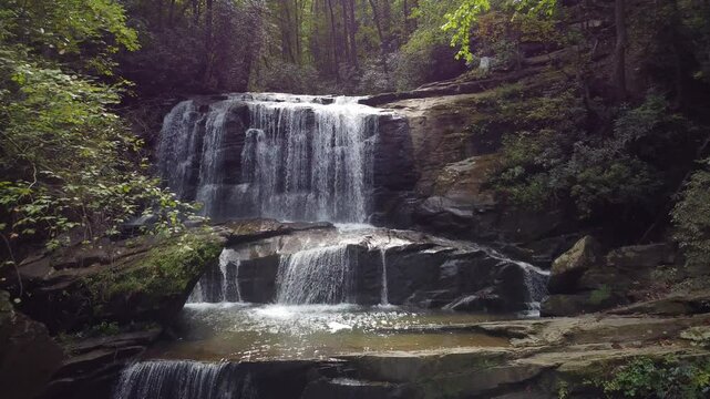 drone shot of Little Bradley Falls, a waterfall in the forest of North Carolina in the Great Smoky mountains.