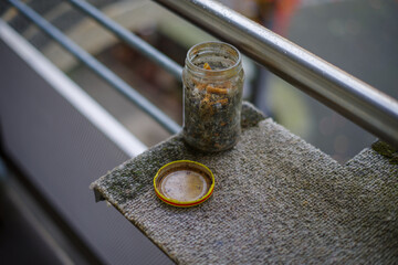 Smoking cigarettes on the balcony, tobacco addiction