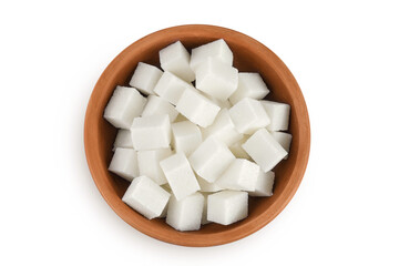 Sugar cubes in a ceramic bowl isolated on white background. Top view. Flat lay