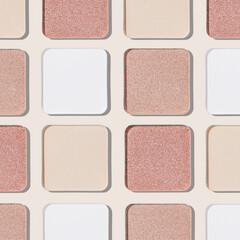 Cosmetics texture pattern, makeup palette pastel neutral color eye shadow, square eye powder swatches. Female cosmetic and beauty products, aesthetic minimal beauty photo, shimmer eyeshade, top view