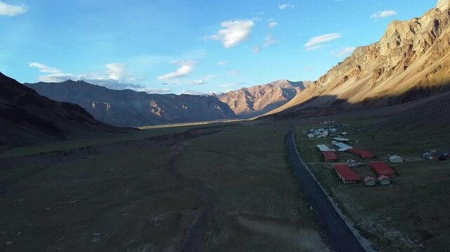 An aerial view of beautiful himalayan mountains in the evening at sarchu with tsarap river, keylong-leh road lahul, himachal pradesh, India.