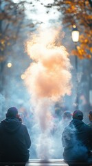 Urban Haze. Two men dark jackets sitting with orange smoke autumn city