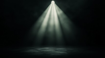A brilliant beam of light pierces the darkness, creating a captivating focus on the ground