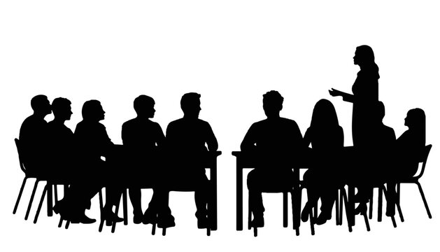 Silhouette of a speaker addressing an audience at a table