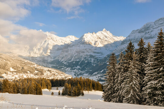 Beautiful winter mountain landscape in Sunny weather with views of Grindelwald, Bernese Oberland, Switzerland.