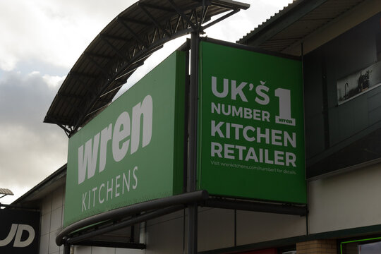 sign and logo of Wren Kitchens, the designers, manufacturers and retailers of fitted kitchens and bedrooms sold through more than 100 stores in the UK
