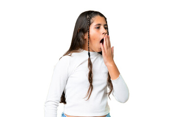 Young girl over isolated chroma key background yawning and covering wide open mouth with hand