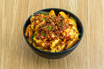 This delicious combination of crispy fries, smoky bacon, and melted cheese is a favorite among lovers of comfort and savory food.