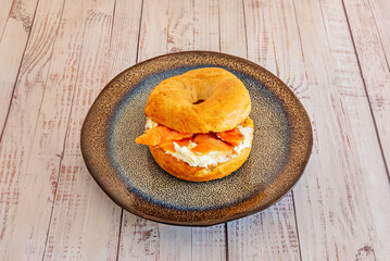 After the dough is formed into rings, it undergoes a brief fermentation before being brought to boiling water, which gives them that firm, shiny crus