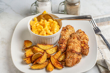 chicken fingers  with mac and cheese