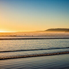 Obraz premium A tranquil beach in Byron Bay, the morning sun glinting off the gentle waves and early surfers paddling out. 
