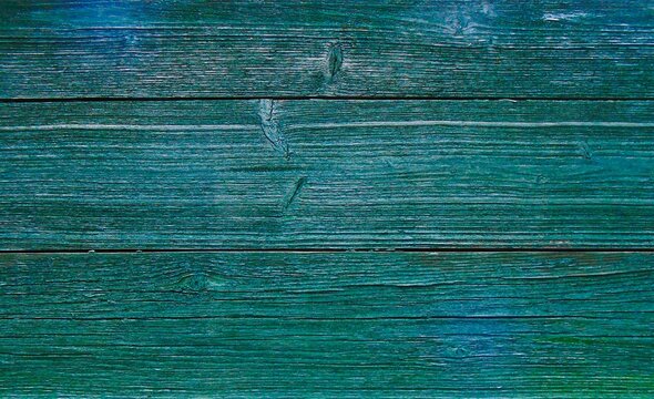 Dunkelgr&uuml;ne Holzmaserung als Nahaufnahme und Hintergrundbild mit Platz f&uuml;r Text