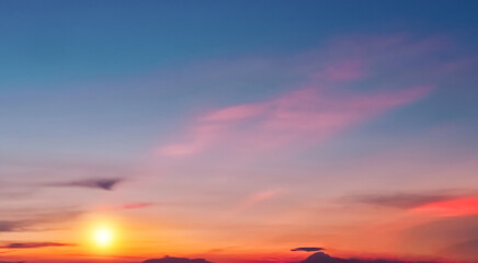 Sky Dusk Background,Sunset Dramatic Pink, Orange, Red,Yellow Sky, Cloud with golden sunlight over sea beach in evening summer,Nature landscape banner,Horizon Sunrise sky pastel blue,purple in morning