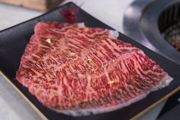 Premium marbled luxury sliced wagyu beef meat for yakiniku grilled steak sukiyaki