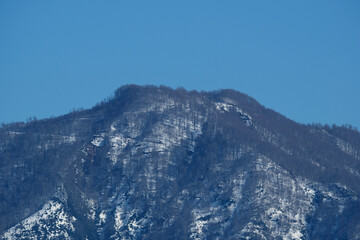 Mountain covered with snow on a sunny winter day in Georgia