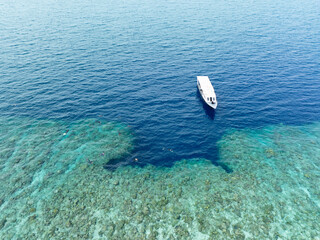 Naklejka premium Beautiful coral reefs surround Bunaken National Marine Park near Manado in North Sulawesi, Indonesia. This tropical, scenic region harbors spectacular marine biodiversity.