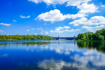 Obraz premium View of the historic dam wall at Möhnesee. Möhne Dam with the surrounding nature. 