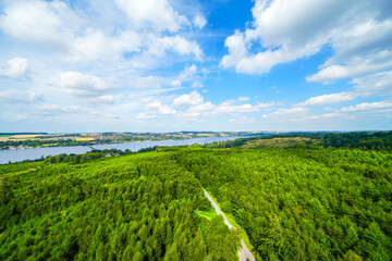 View from the observation tower at Möhnesee of the surrounding green landscape. Nature at...
