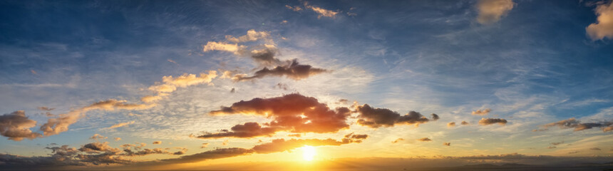 A beautiful sunset sky with yellow and orange colours as a background or texture