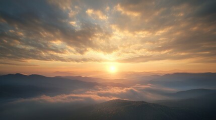 Fototapeta premium Golden Sunrise Over Misty Mountains: A Breathtaking View
