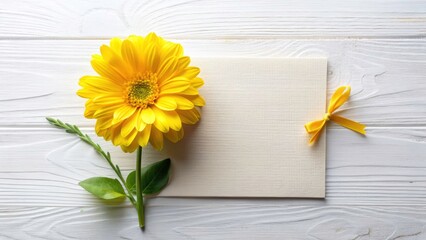 Obraz premium Vintage Style Greeting Card with Yellow Flower on White Background for Spring and Summer Celebrations, Perfect for Weddings and Birthdays, Top View Composition with Copy Space