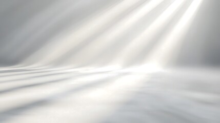 Obraz premium Grey studio background with dramatic lighting and soft shadows.