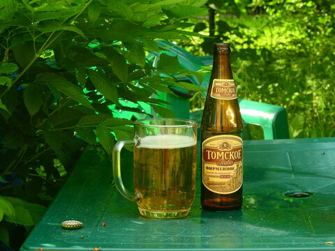Tomsk Tomskoye Russian lager type beer in a summer garden