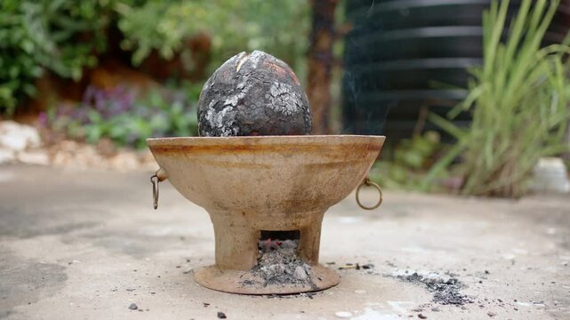 Roasting Breadfruit from the side 100fps