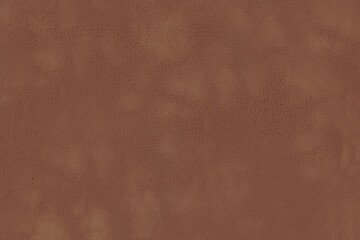 The surface of a brown concrete wall with stains.