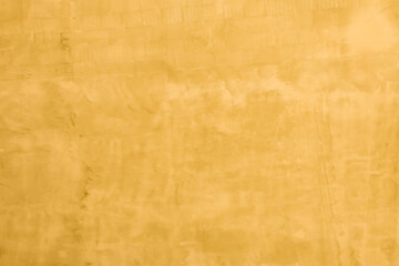 Close-up Deep texture of brown colored porous stone on the facade of a building.